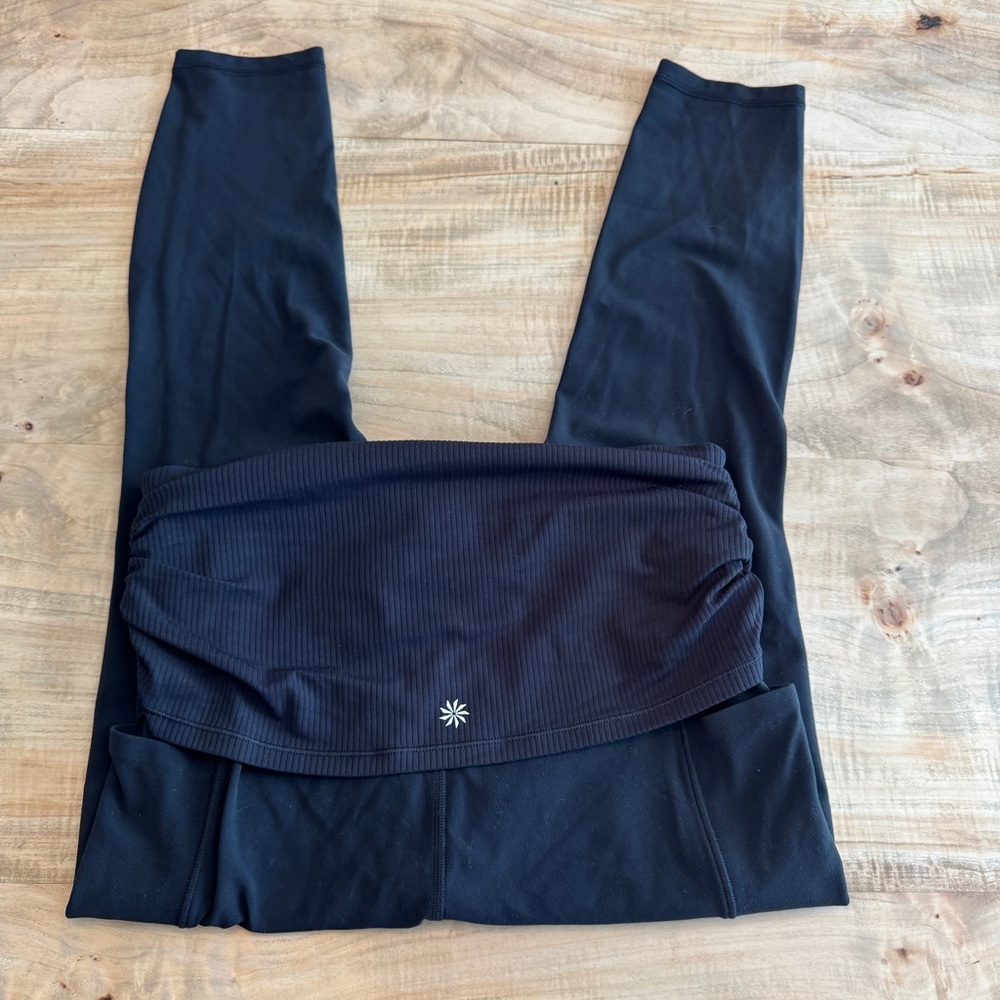 Athleta Salutation Stash 7/8 fold over tight leggings, black size Medium.